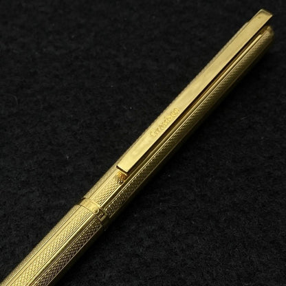 PILOT Grandee 22KGP gold ballpoint pen with black body and twist mechanism, includes refill, no visible damage