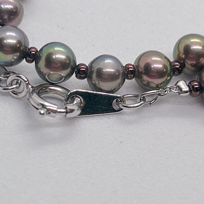 Akoya pearl necklace with baby black aurora pearls measuring 5.3-5.4mm on a 40cm chain