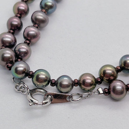 Akoya pearl necklace with baby black aurora pearls measuring 5.3-5.4mm on a 40cm chain
