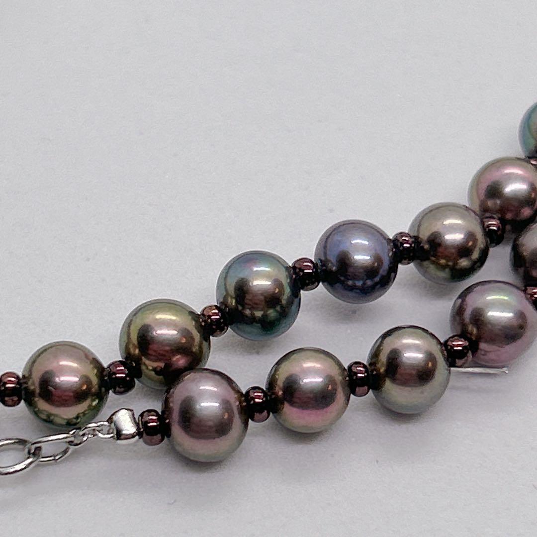 Akoya pearl necklace with baby black aurora pearls measuring 5.3-5.4mm on a 40cm chain