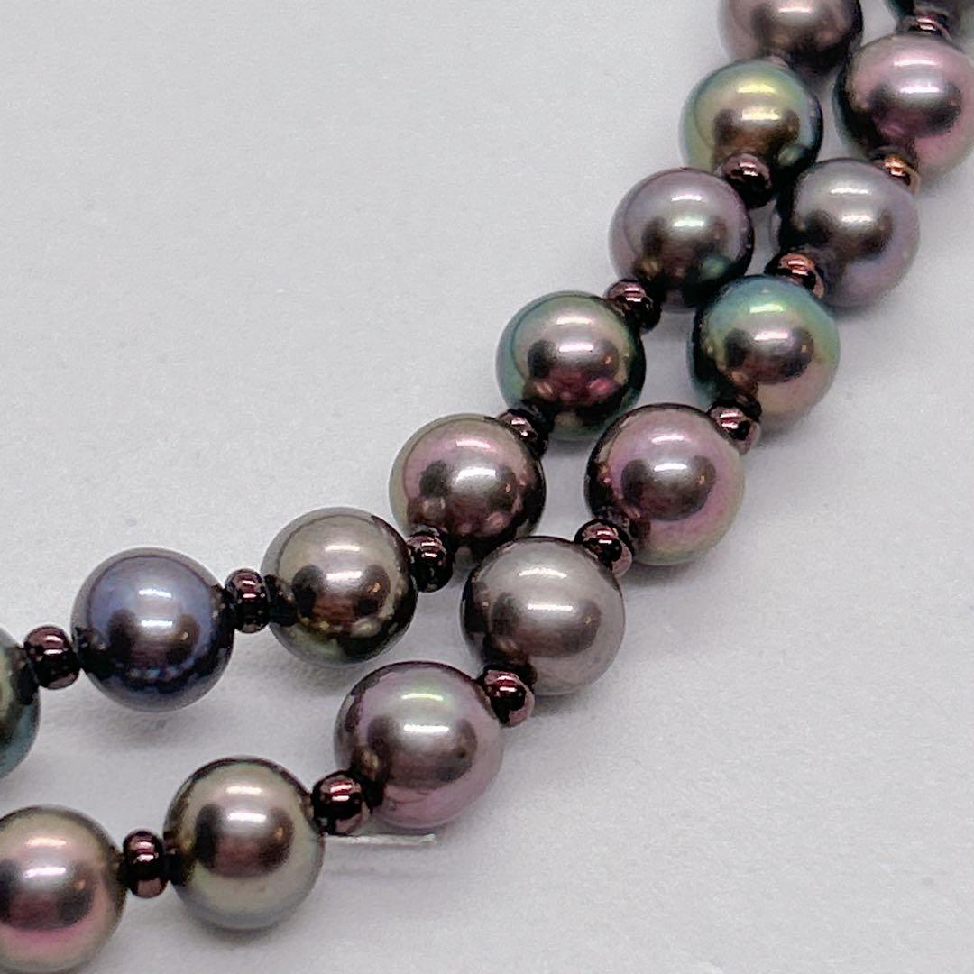 Akoya pearl necklace with baby black aurora pearls measuring 5.3-5.4mm on a 40cm chain
