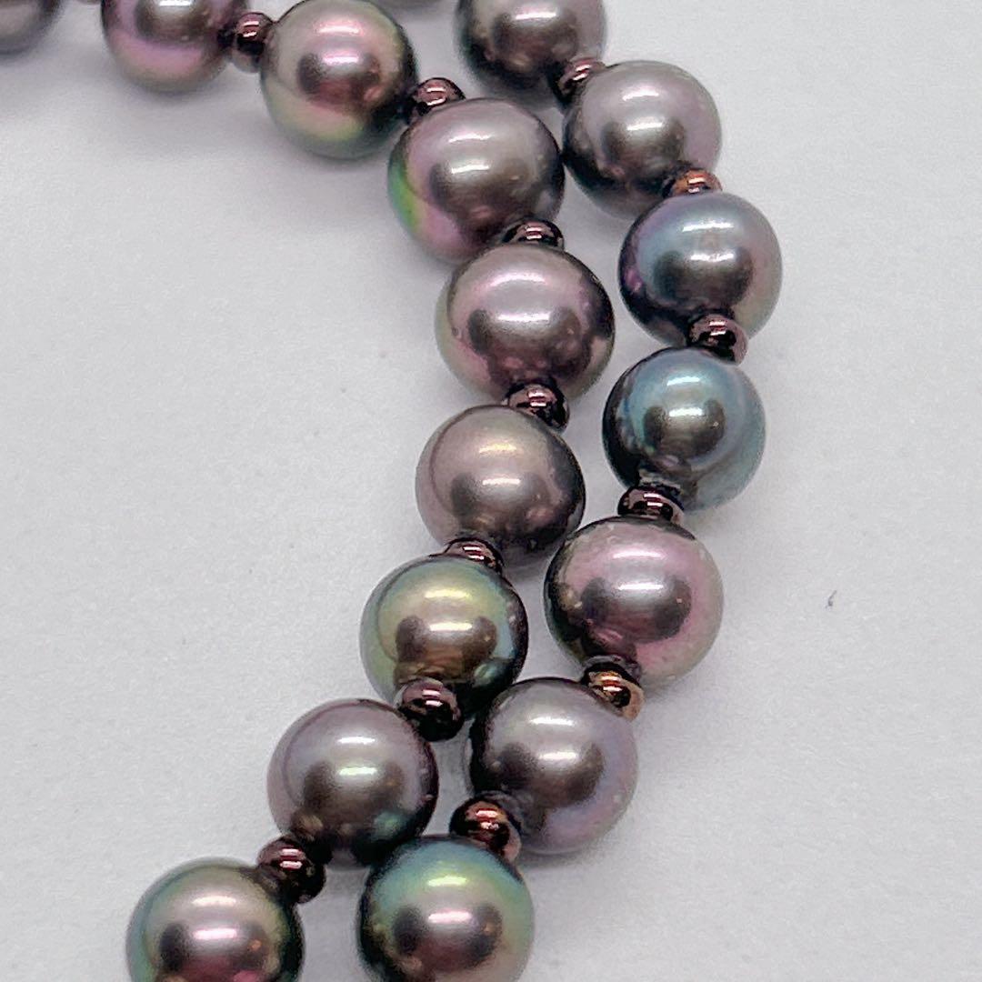 Akoya pearl necklace with baby black aurora pearls measuring 5.3-5.4mm on a 40cm chain