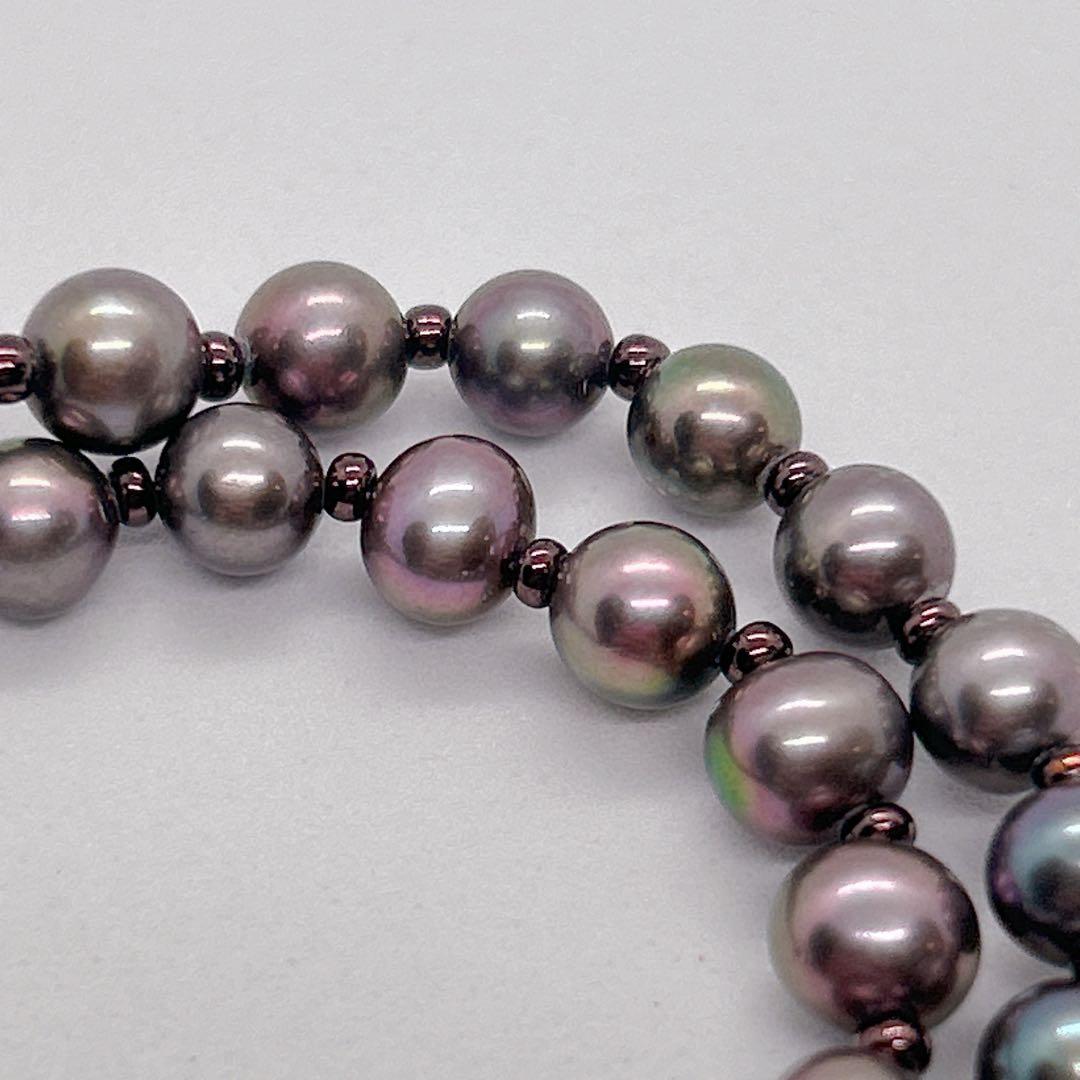 Akoya pearl necklace with baby black aurora pearls measuring 5.3-5.4mm on a 40cm chain