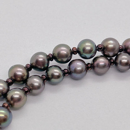 Akoya pearl necklace with baby black aurora pearls measuring 5.3-5.4mm on a 40cm chain