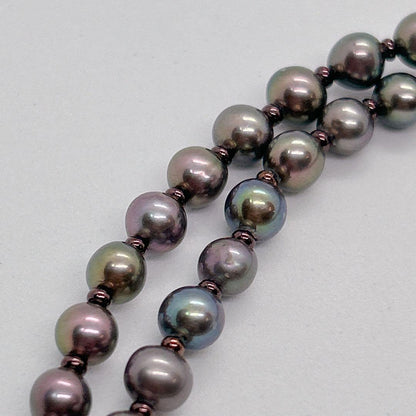 Akoya pearl necklace with baby black aurora pearls measuring 5.3-5.4mm on a 40cm chain