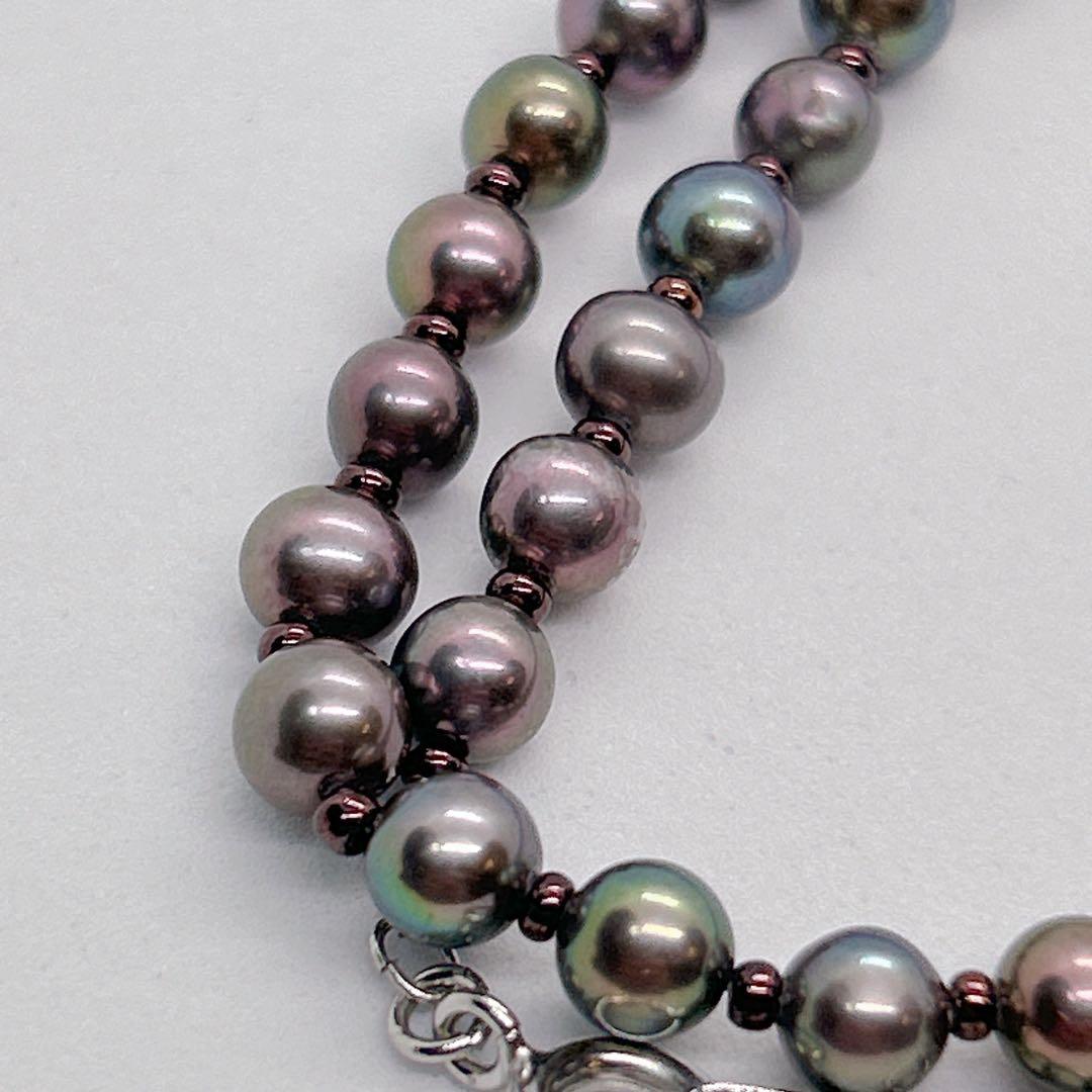 Akoya pearl necklace with baby black aurora pearls measuring 5.3-5.4mm on a 40cm chain