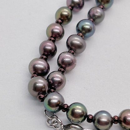 Akoya pearl necklace with baby black aurora pearls measuring 5.3-5.4mm on a 40cm chain