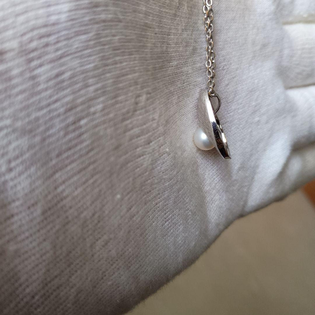 Tazaki Necklace featuring Puffy Mother-of-Pearl top design with maximum length of 23 cm and distinctive markings