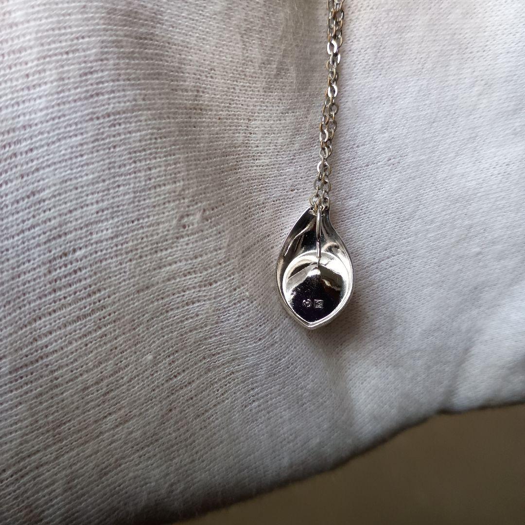 Tazaki Necklace featuring Puffy Mother-of-Pearl top design with maximum length of 23 cm and distinctive markings