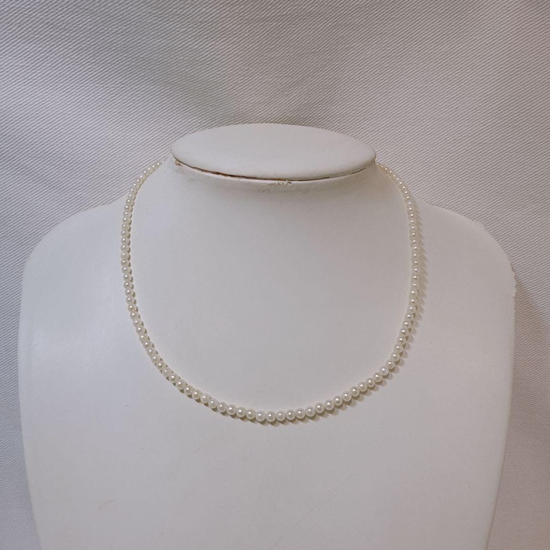 14K gold clasp Akoya baby pearl necklace with 2.8 to 3.3mm pearls on a 40cm chain