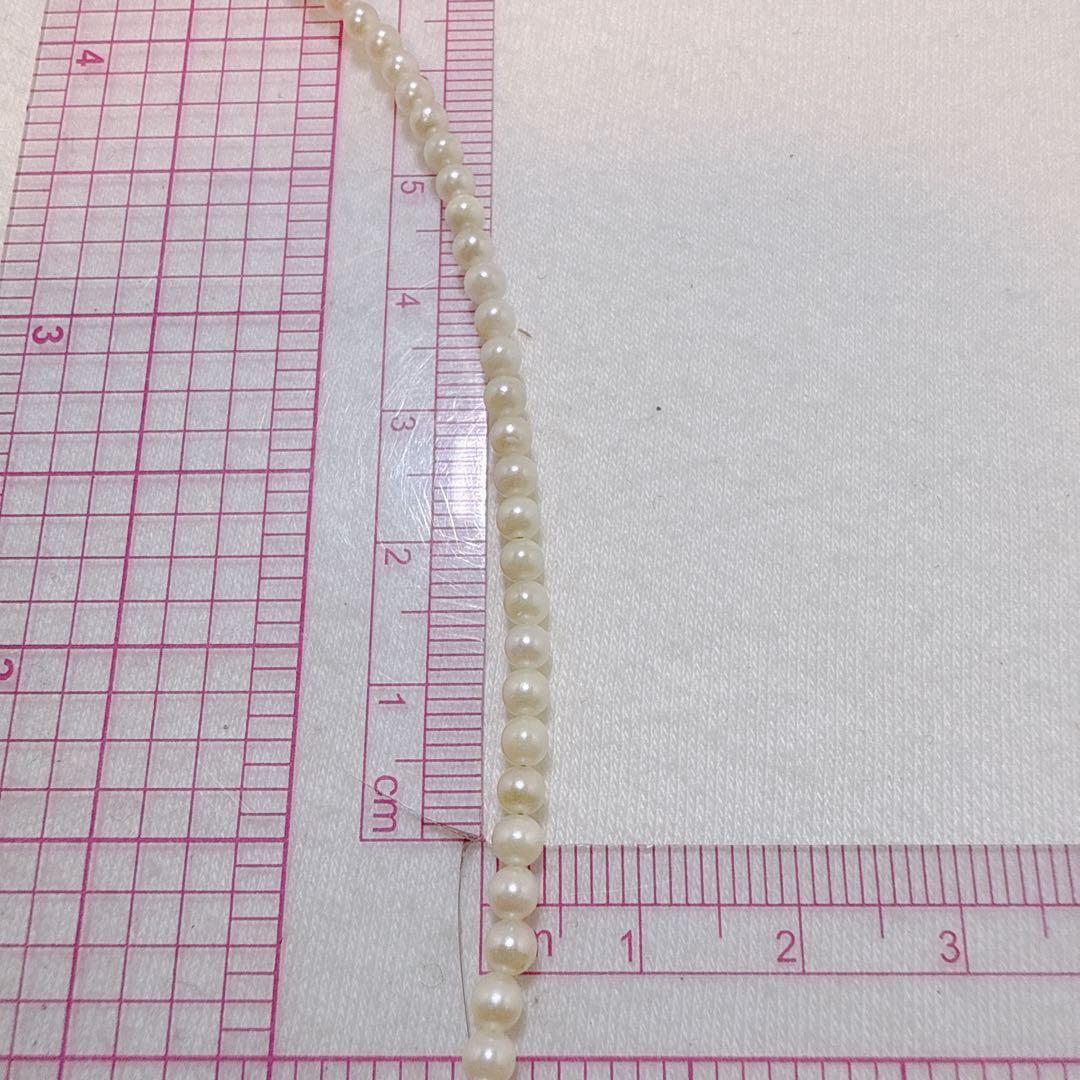 14K gold clasp Akoya baby pearl necklace with 2.8 to 3.3mm pearls on a 40cm chain