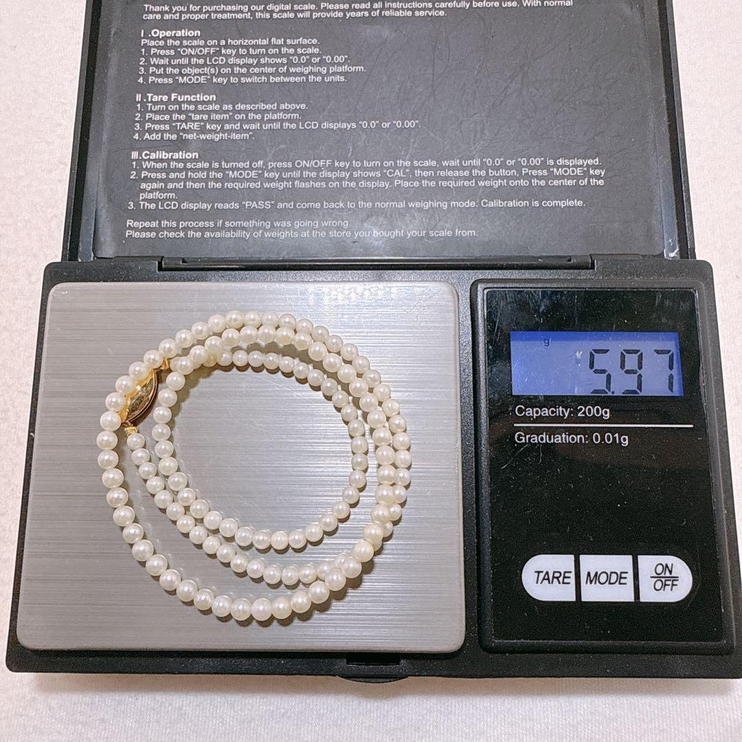 14K gold clasp Akoya baby pearl necklace with 2.8 to 3.3mm pearls on a 40cm chain