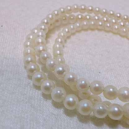14K gold clasp Akoya baby pearl necklace with 2.8 to 3.3mm pearls on a 40cm chain