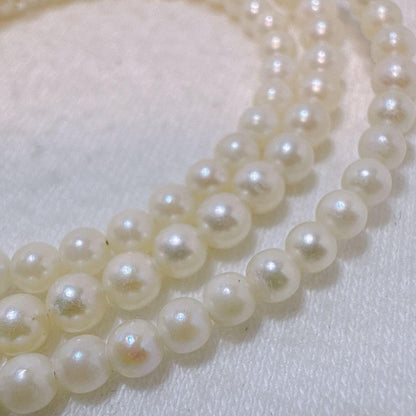 14K gold clasp Akoya baby pearl necklace with 2.8 to 3.3mm pearls on a 40cm chain