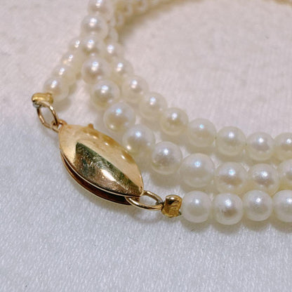 14K gold clasp Akoya baby pearl necklace with 2.8 to 3.3mm pearls on a 40cm chain