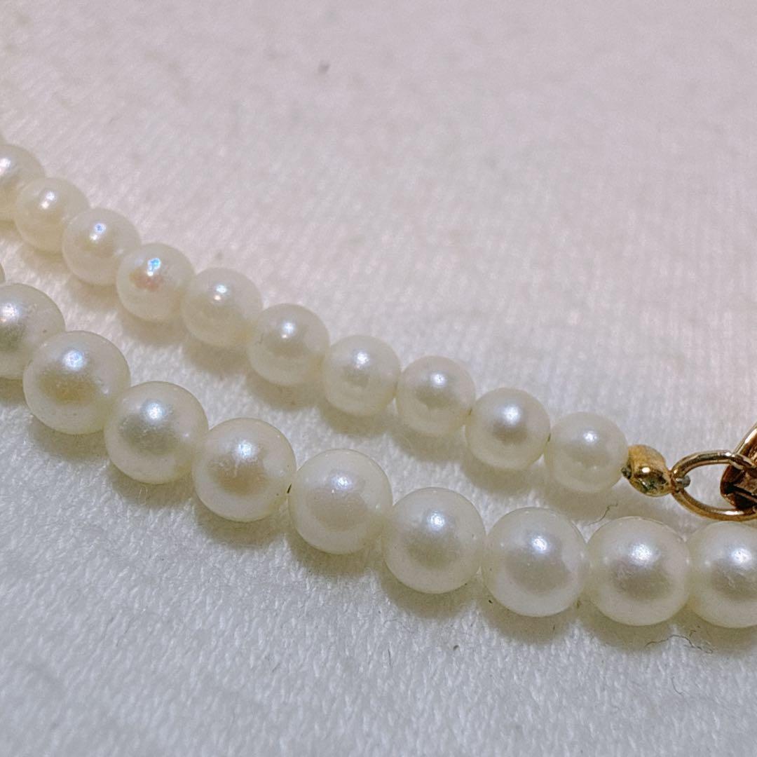 14K gold clasp Akoya baby pearl necklace with 2.8 to 3.3mm pearls on a 40cm chain