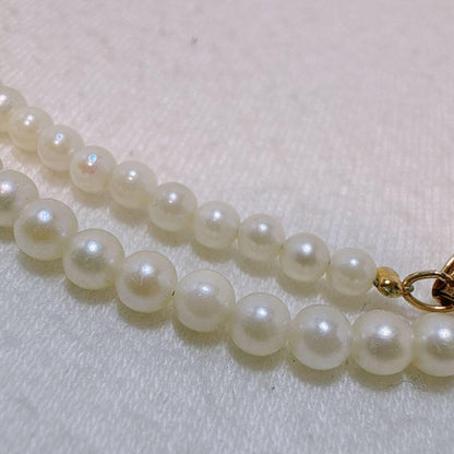 14K gold clasp Akoya baby pearl necklace with 2.8 to 3.3mm pearls on a 40cm chain