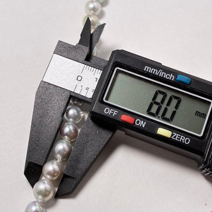Shining genuine Japan Akoya pearl necklace with blue gray pearls sized 7.3 to 8.0 mm on a 42cm chain