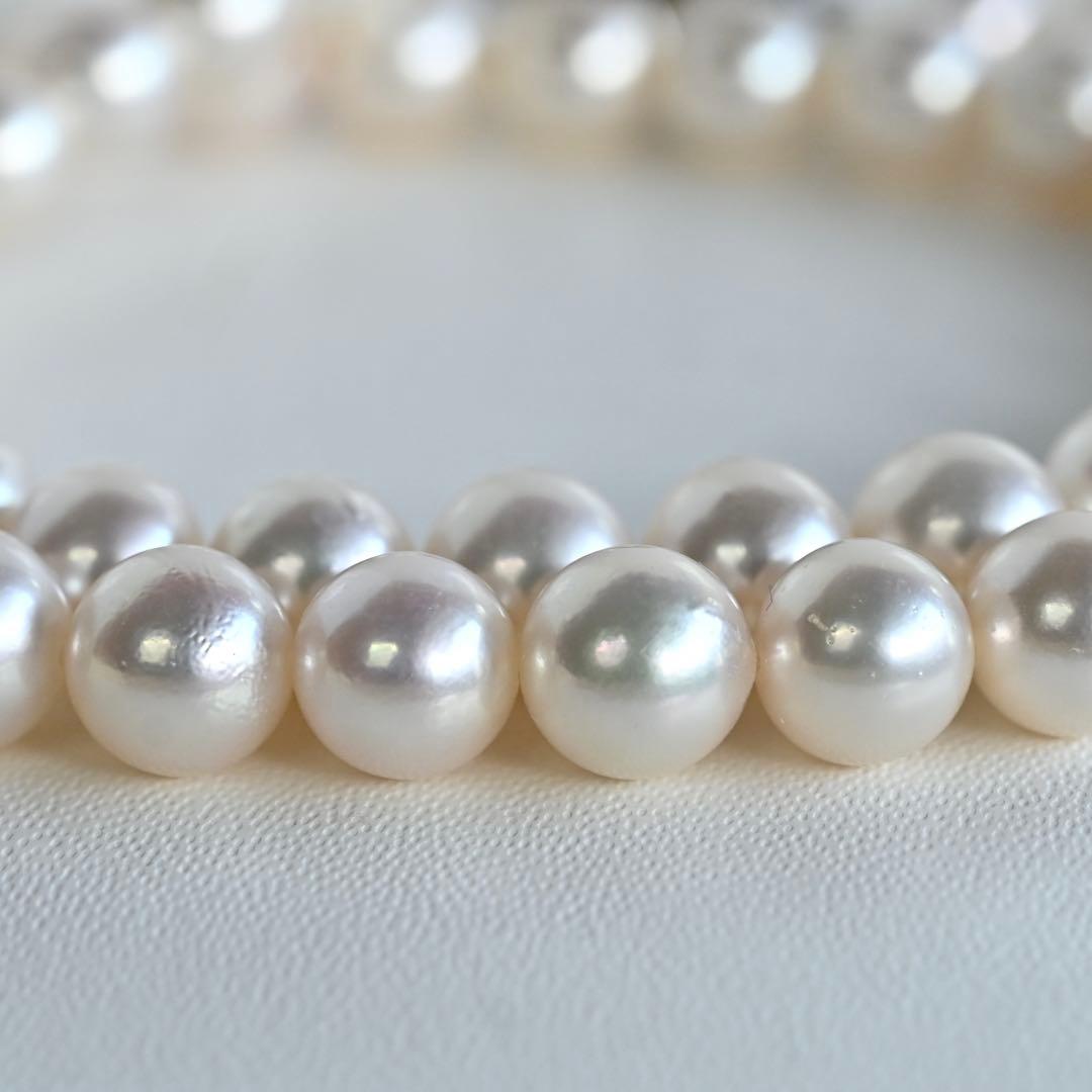 Aurora Pink Tassel Akoya Pearl Necklace with 7.5mm round pearls and silver clasp, 42cm length