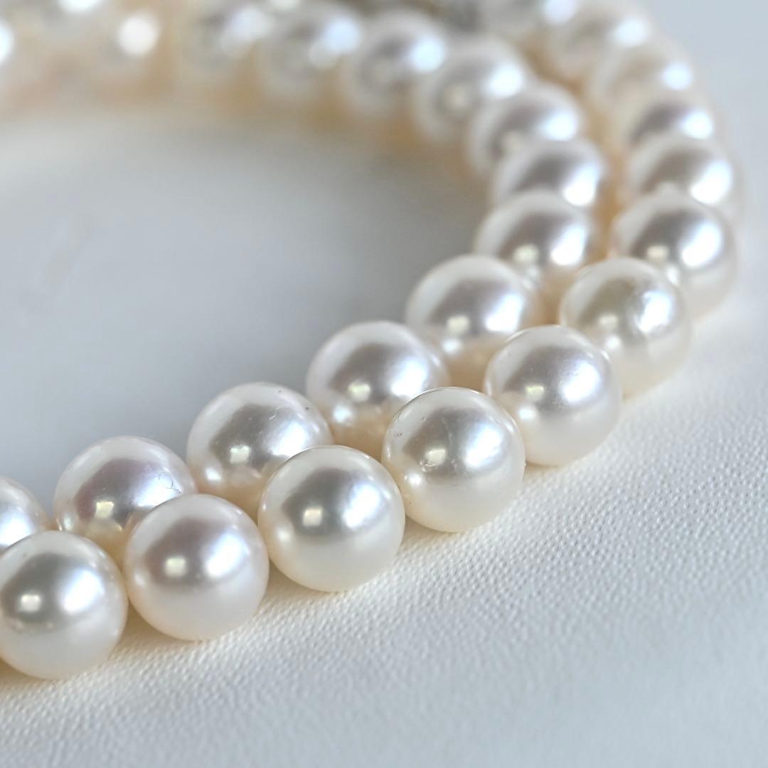 Aurora Pink Tassel Akoya Pearl Necklace with 7.5mm round pearls and silver clasp, 42cm length