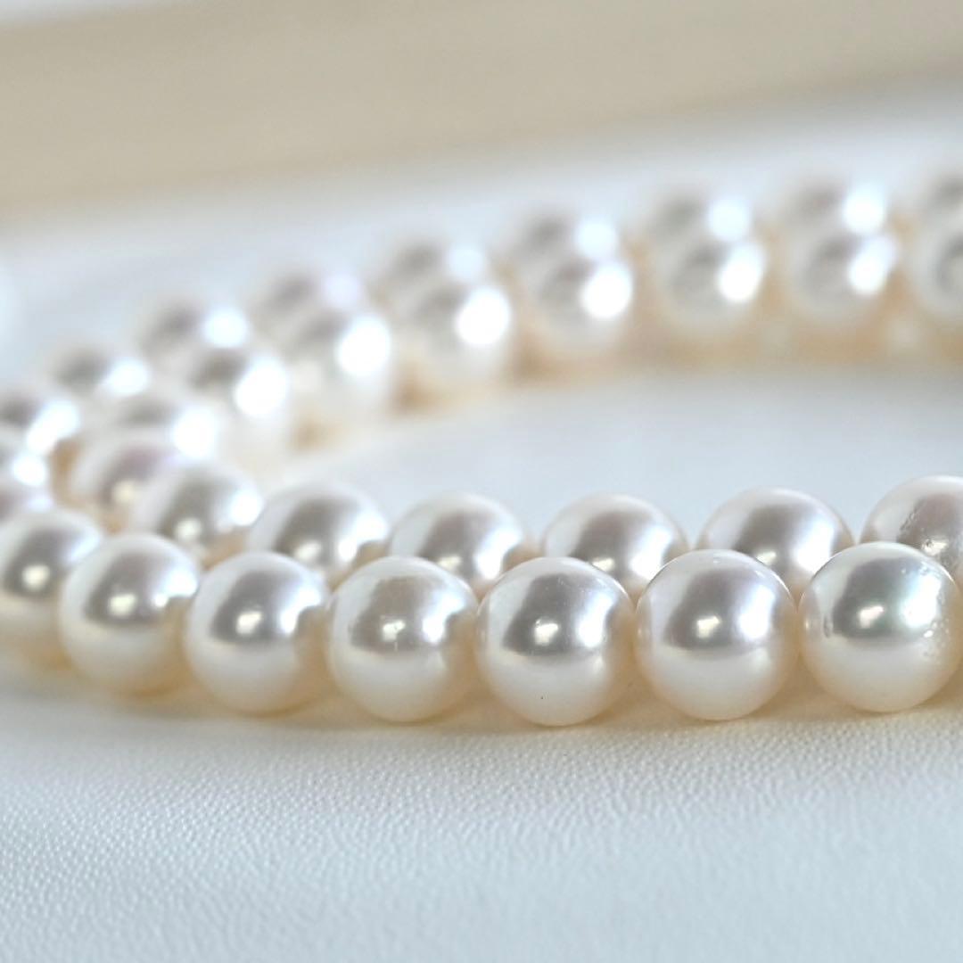 Aurora Pink Tassel Akoya Pearl Necklace with 7.5mm round pearls and silver clasp, 42cm length