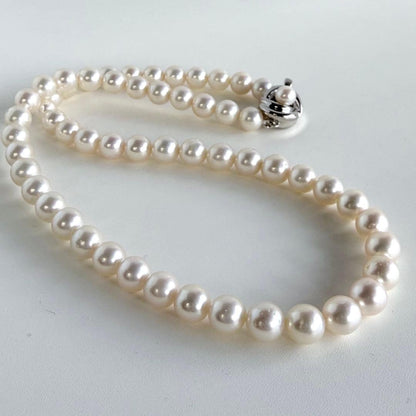 Aurora Pink Tassel Akoya Pearl Necklace with 7.5mm round pearls and silver clasp, 42cm length