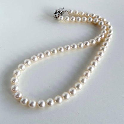 Aurora Pink Tassel Akoya Pearl Necklace with 7.5mm round pearls and silver clasp, 42cm length
