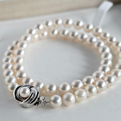 Aurora Pink Tassel Akoya Pearl Necklace with 7.5mm round pearls and silver clasp, 42cm length