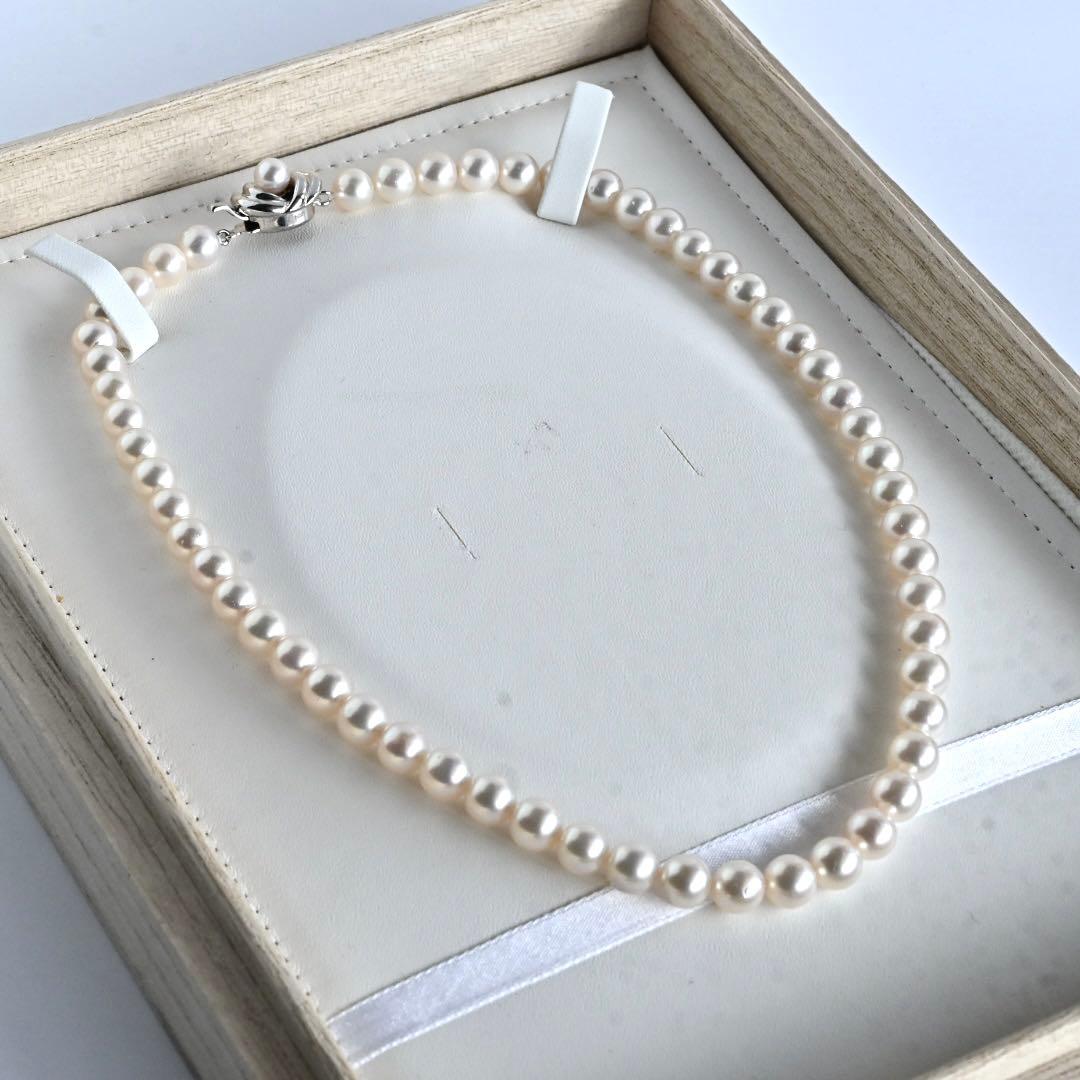Aurora Pink Tassel Akoya Pearl Necklace with 7.5mm round pearls and silver clasp, 42cm length