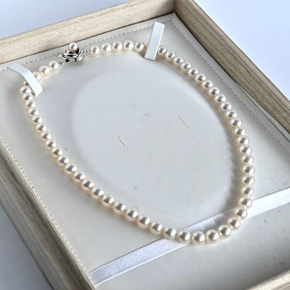 Aurora Pink Tassel Akoya Pearl Necklace with 7.5mm round pearls and silver clasp, 42cm length