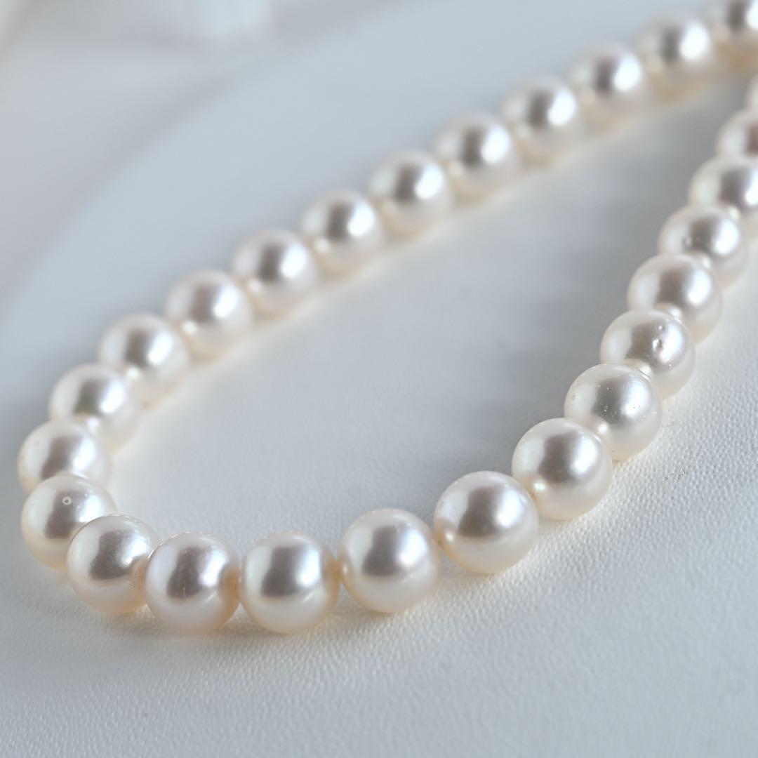 Aurora Pink Tassel Akoya Pearl Necklace with 7.5mm round pearls and silver clasp, 42cm length