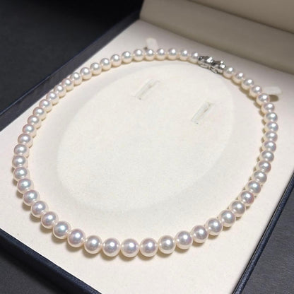 TASAKI Akoya Pearl Necklace with 8.0mm white pearls and silver clasp, 43 cm length, showing strong luster and aurora color