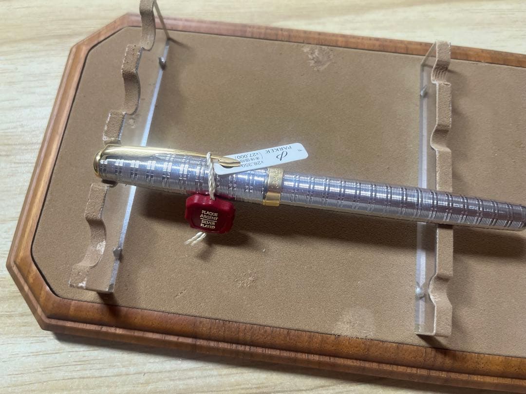 PILOT Parker fountain pen with transparent barrel, showing metal parts and original packaging