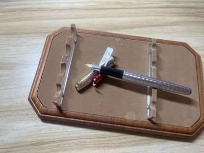 PILOT Parker fountain pen with transparent barrel, showing metal parts and original packaging
