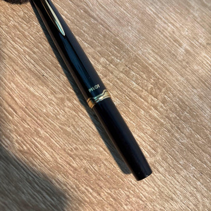 Pilot Short Fountain Pen in black and gold with 14k nib, elegant design and compact size