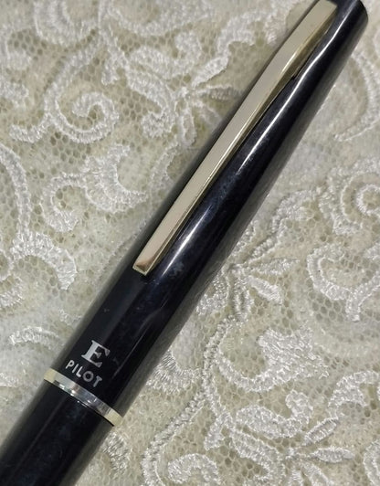 Pilot E fountain pen with 14K nib showing replaced ink and used condition