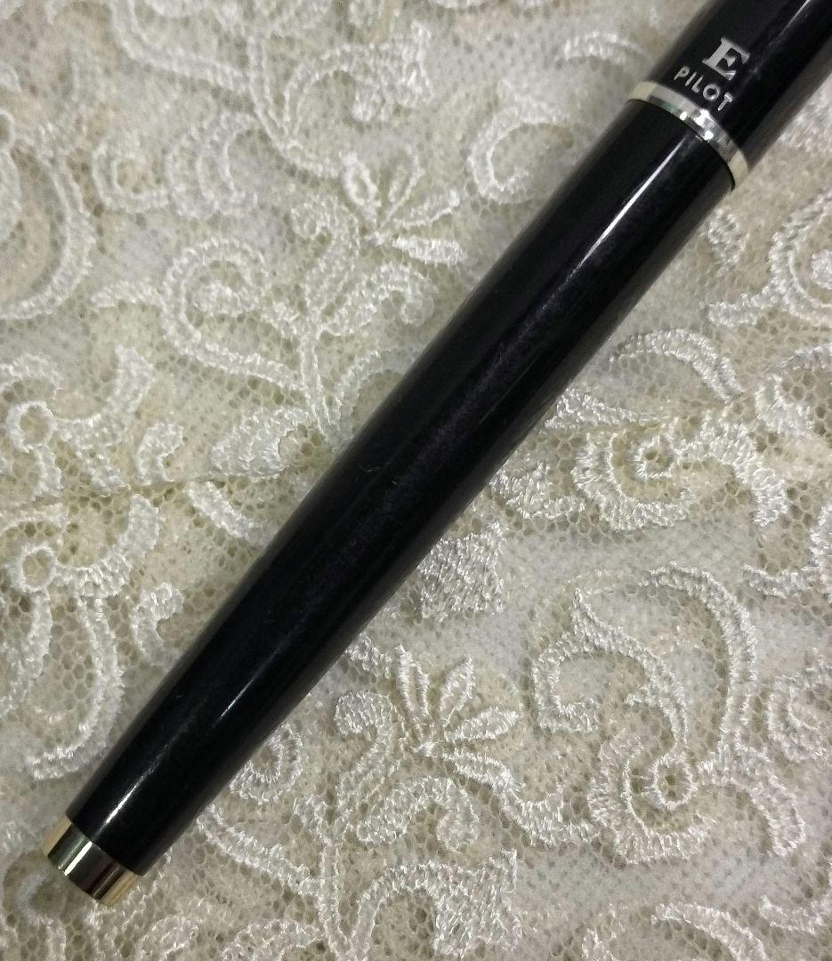 Pilot E fountain pen with 14K nib showing replaced ink and used condition