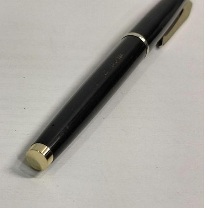 Pilot E fountain pen with 14K nib showing replaced ink and used condition