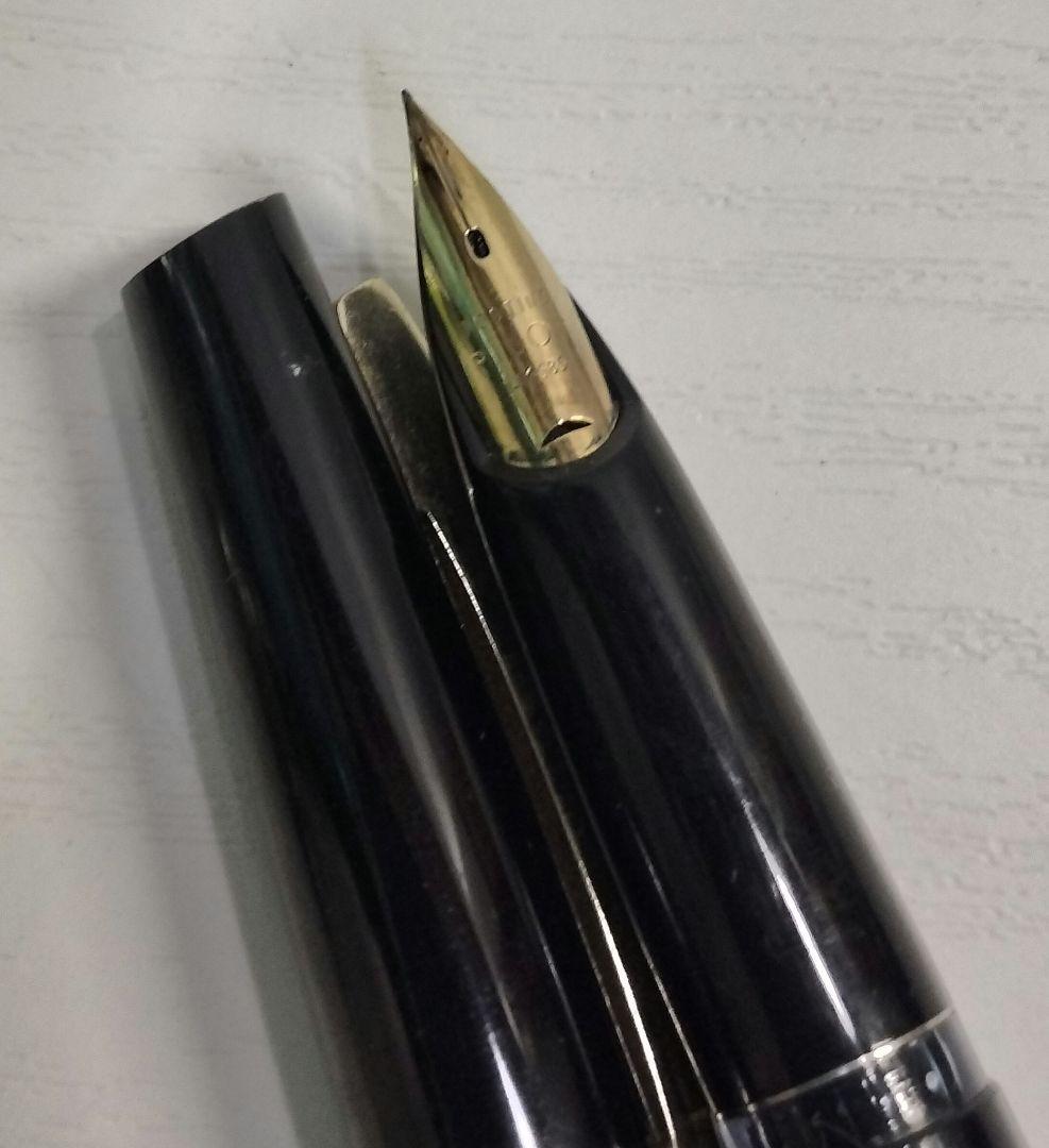 Pilot E fountain pen with 14K nib showing replaced ink and used condition
