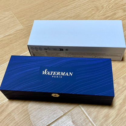 Waterman Expert Essential Metallic CT fountain pen with metallic finish and gold trim, shown uncapped on white background
