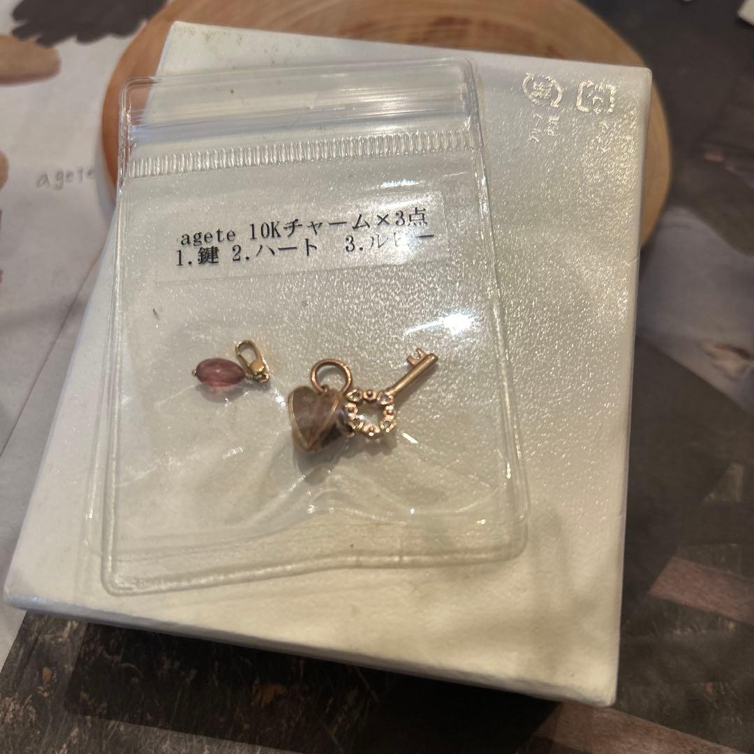 Agete 10K gold heart and key charms 3-piece set with diamond and ruby accents in gold color