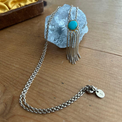 Agot Turquoise silver pendant with round cut stone and gold tone multiple hanging chains in tassel design