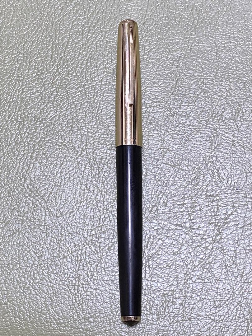 Pilot 14k Fountain Pen in gold finish showcasing nib and cap for premium writing