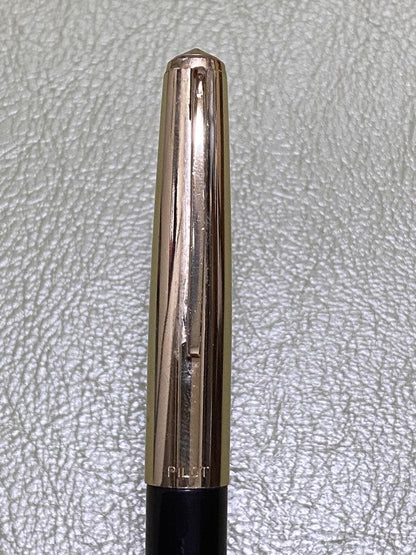 Pilot 14k Fountain Pen in gold finish showcasing nib and cap for premium writing