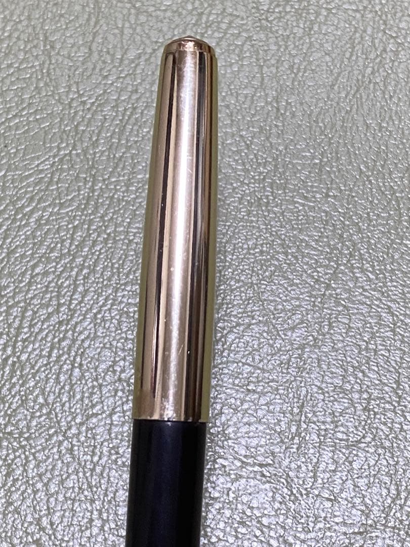 Pilot 14k Fountain Pen in gold finish showcasing nib and cap for premium writing