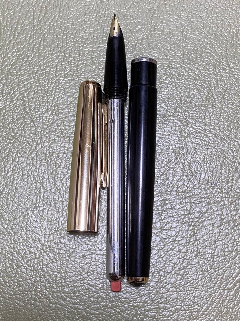 Pilot 14k Fountain Pen in gold finish showcasing nib and cap for premium writing