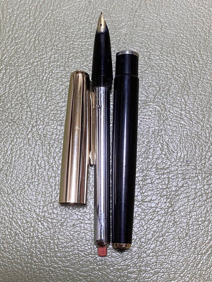 Pilot 14k Fountain Pen in gold finish showcasing nib and cap for premium writing