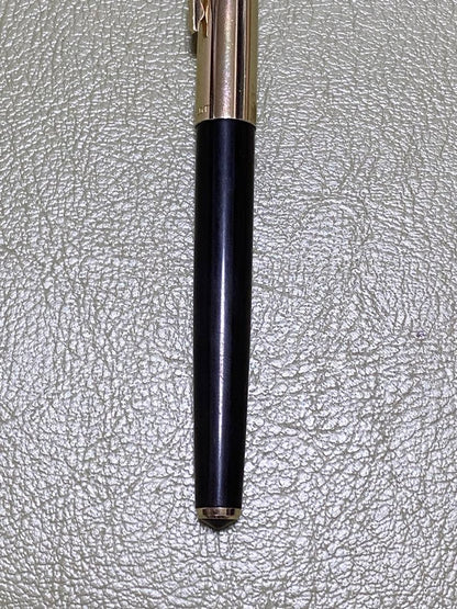 Pilot 14k Fountain Pen in gold finish showcasing nib and cap for premium writing
