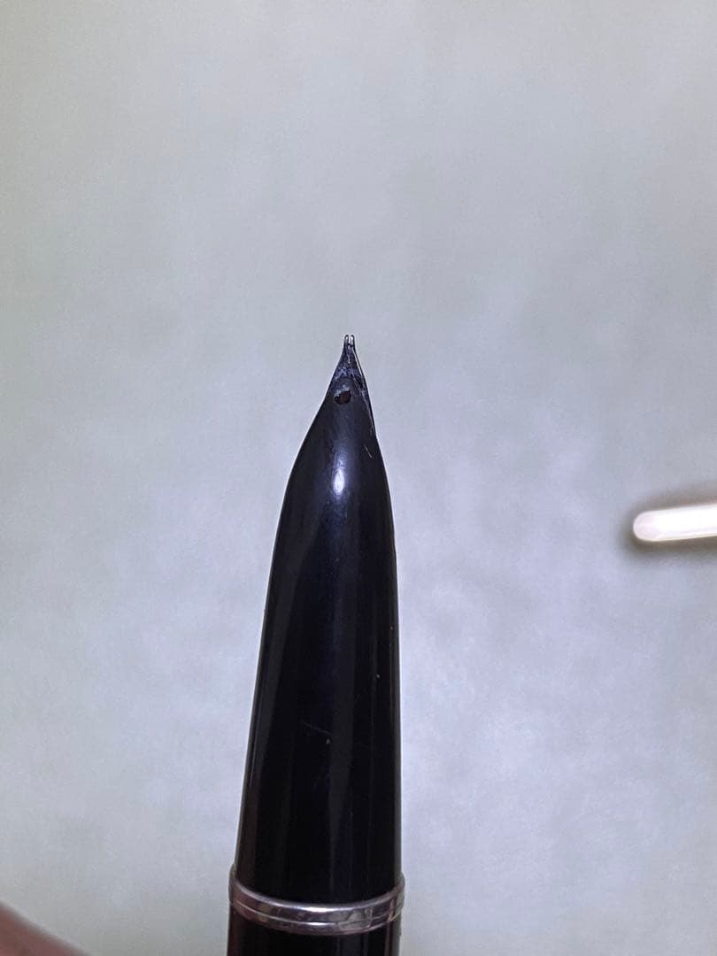 Pilot 14k Fountain Pen in gold finish showcasing nib and cap for premium writing