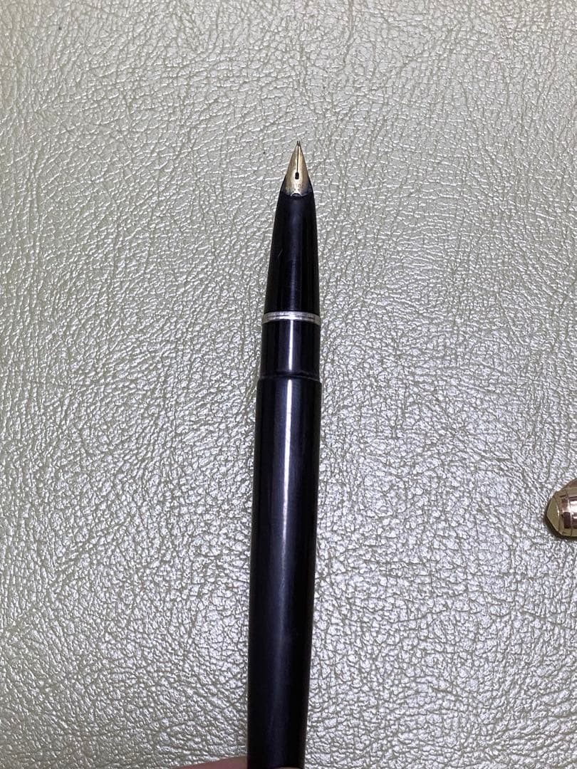 Pilot 14k Fountain Pen in gold finish showcasing nib and cap for premium writing